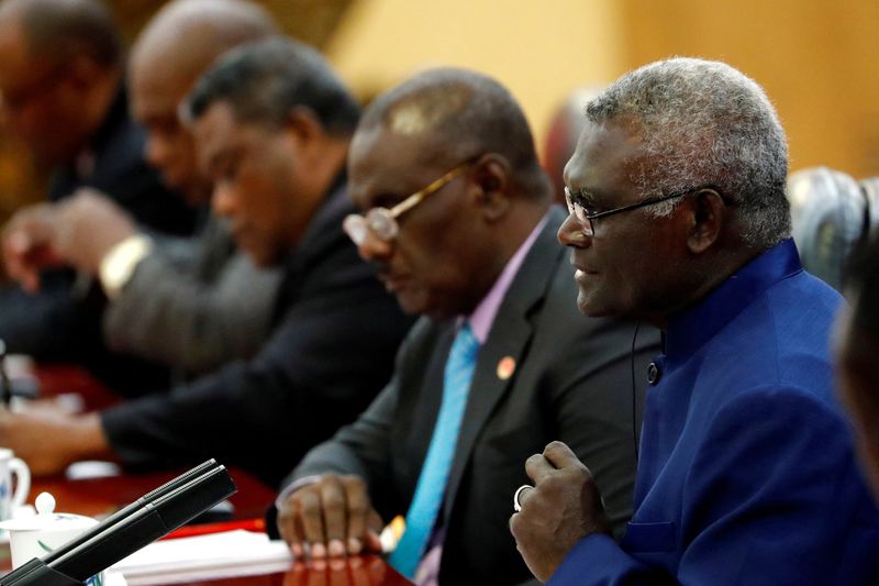 &copy; Reuters. FILE PHOTO: Solomon Islands Prime Minister Manasseh Sogavare attends a meeting with Chinese Premier Li Keqiang (not pictured) at the Great Hall of the People in Beijing, China October 9, 2019.  REUTERS/Thomas Peter