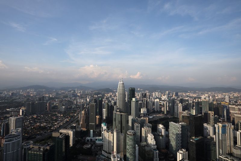 &copy; Reuters. FILE PHOTO: A view of the city skyline in Kuala Lumpur  Malaysia July 2, 2020. REUTERS/Lim Huey Teng/File Photo