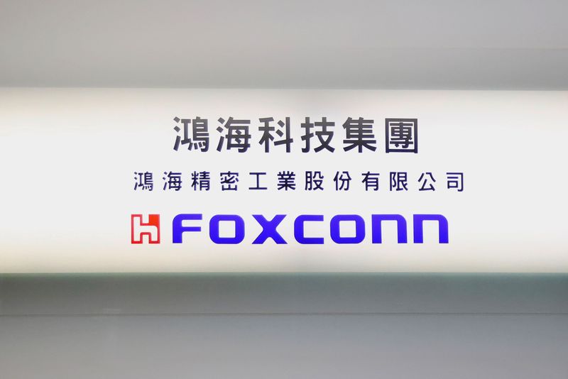 &copy; Reuters. FILE PHOTO: A sign of Foxconn is seen inside its office building in Taipei, Taiwan November 12, 2020. REUTERS/Ann Wang