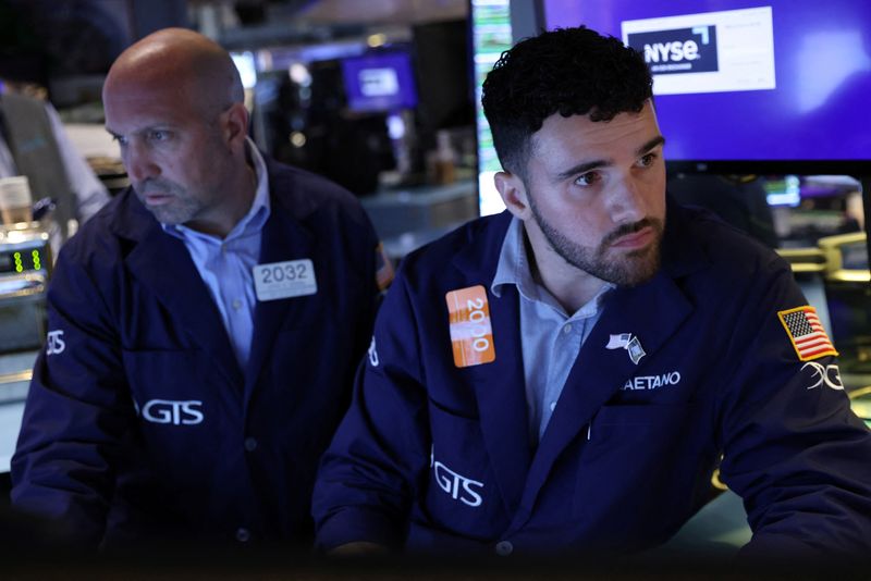 &copy; Reuters. Traders work on the trading floor at the New York Stock Exchange (NYSE) in Manhattan, New York City, U.S., August 8, 2022. REUTERS/Andrew Kelly