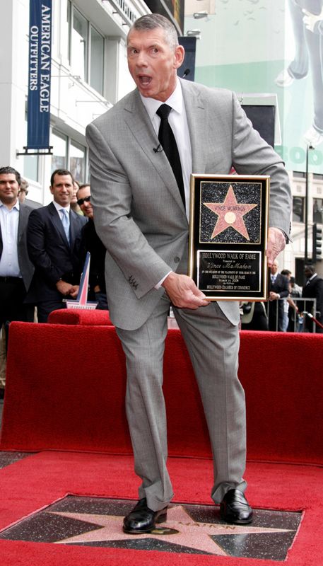 &copy; Reuters. FILE PHOTO: Vince McMahon, World Wrestling Entertainment, Inc. chairman, poses with his Hollywood Walk of Fame star during an unveiling ceremony in Hollywood March 14, 2008.  REUTERS/Fred Prouser/File Photo