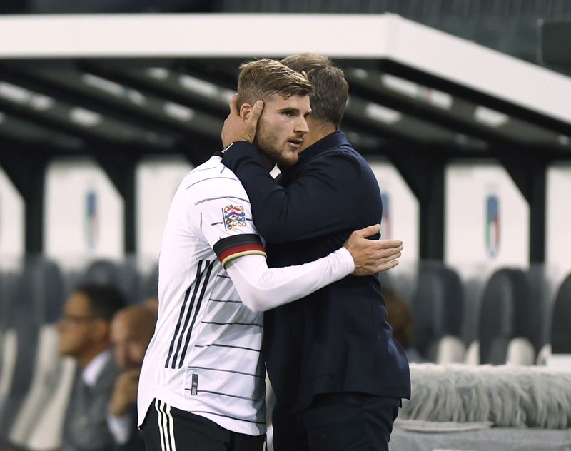 &copy; Reuters. FILE PHOTO: Soccer Football - UEFA Nations League - Group C - Germany v Italy - Borussia-Park, Moenchengladbach, Germany - June 14, 2022 Germany's Timo Werner with coach Hansi Flick after he was substituted REUTERS/Heiko Becker