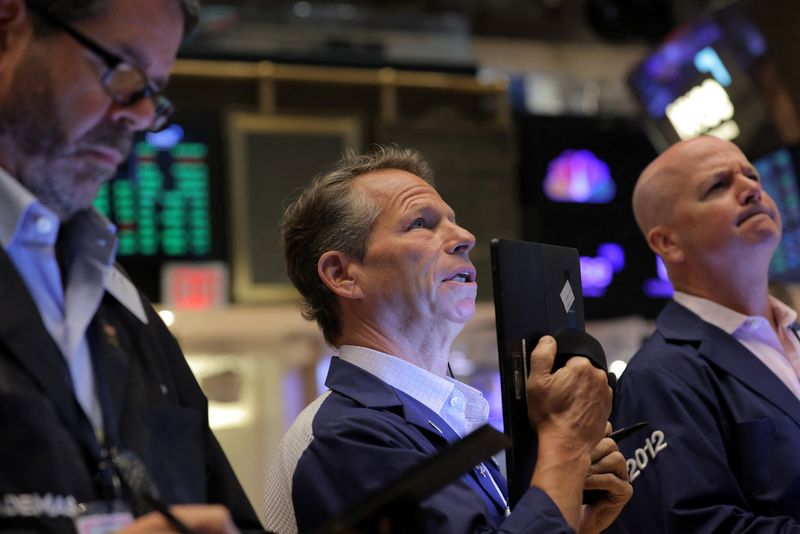 &copy; Reuters. Traders work on the trading floor at the New York Stock Exchange (NYSE) in Manhattan, New York City, U.S., August 8, 2022. REUTERS/Andrew Kelly