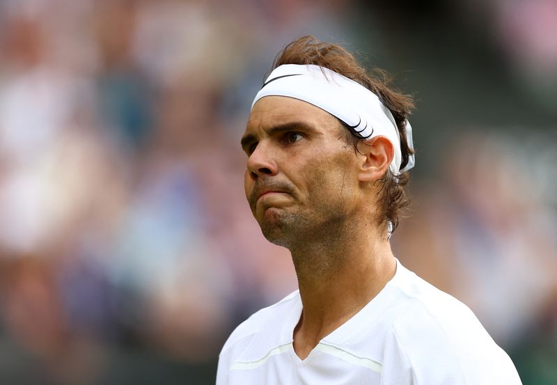 &copy; Reuters. FILE PHOTO: Tennis - Wimbledon - All England Lawn Tennis and Croquet Club, London, Britain - July 6, 2022  Spain's Rafael Nadal reacts during his quarter final match against Taylor Fritz of the U.S. REUTERS/Hannah Mckay