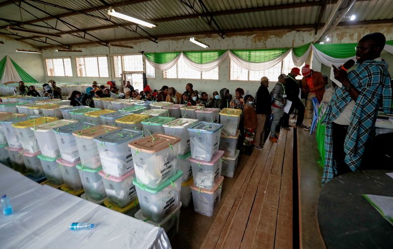 &copy; Reuters. A general view shows polling agents and sealed ballot boxes containing electoral materials at an Independent Electoral and Boundaries Commission (IEBC) tallying centre after the general election in Nairobi, Kenya August 11, 2022. REUTERS/Thomas Mukoya