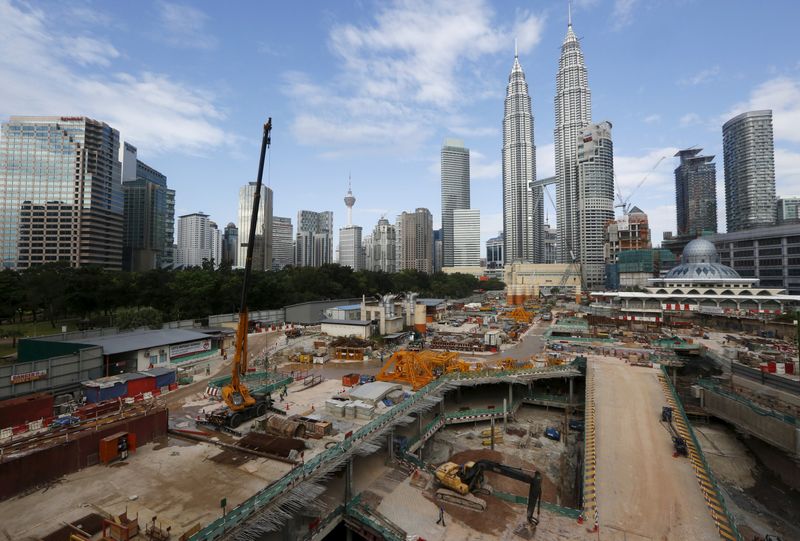 &copy; Reuters. FILE PHOTO: A view of a building site beneath the Petronas Towers in Kuala Lumpur, Malaysia, February 18, 2016. REUTERS/Olivia Harris