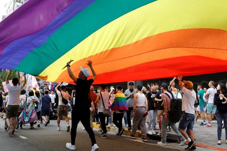 Taiwan blames politics for cancellation of global Pride event By Reuters