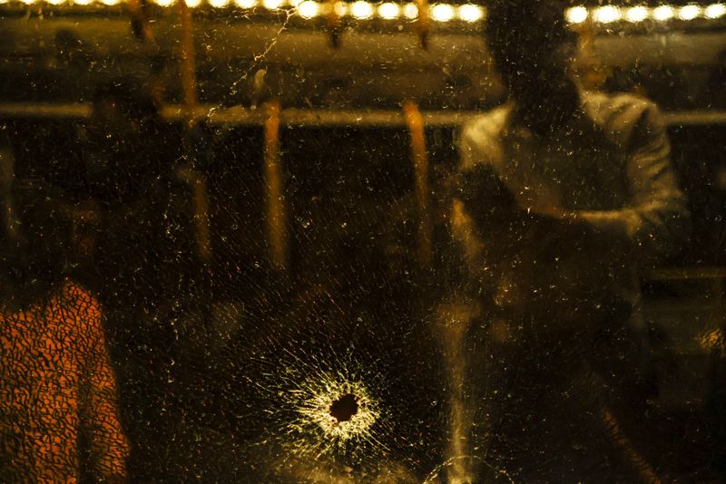 Eight hurt in gun attack on Jewish worshippers' bus in Jerusalem