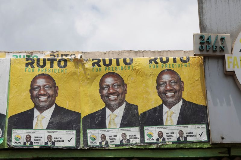 © Reuters. FILE PHOTO: A views shows posters of Kenya's Deputy President William Ruto and presidential candidate for the United Democratic Alliance (UDA) and Kenya Kwanza political coalition on top of the Silverline Butchery restaurant in Eldoret, Kenya August 11, 2022. REUTERS/Baz Ratner