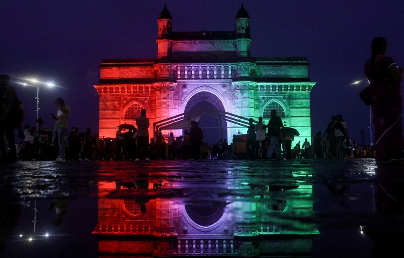 &copy; Reuters. FILE PHOTO: The Gateway of India is lit in the colours of the Indian national flag ahead of its 75th Independence Day, in Mumbai, India, August 13, 2022. REUTERS/Francis Mascarenhas/File Photo