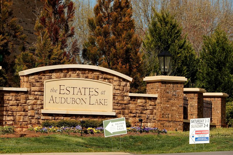 &copy; Reuters. FILE PHOTO: Real estate signs advertise new homes for sale in a new development in York County, South Carolina, U.S., February 29, 2020. REUTERS/Lucas Jackson/File Photo/File Photo
