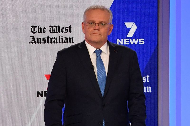 &copy; Reuters. FILE PHOTO: Australian Prime Minister Scott Morrison attends the third leaders' debate at the Seven Network Studios during the 2022 federal election campaign, in Sydney, Australia May 11, 2022. Mick Tsikas/Pool via REUTERS