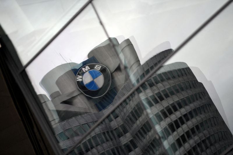 &copy; Reuters. FILE PHOTO: The logo of German car manufacturer BMW is reflected in a window at the company headquarters in Munich, Germany, May 14, 2020. REUTERS/Andreas Gebert