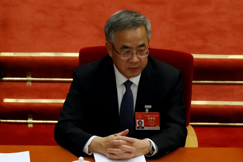 &copy; Reuters. FILE PHOTO: Chinese Vice Premier Hu Chunhua attends the opening session of the National People's Congress (NPC) at the Great Hall of the People in Beijing, China March 5, 2021. REUTERS/Carlos Garcia Rawlins