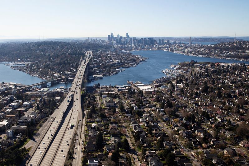 &copy; Reuters. Cars drive on Interstate 5 during the outbreak of coronavirus disease (COVID-19), shown in this aerial photo over Seattle, Washington, U.S. March 16, 2020.  REUTERS/Lindsey Wasson