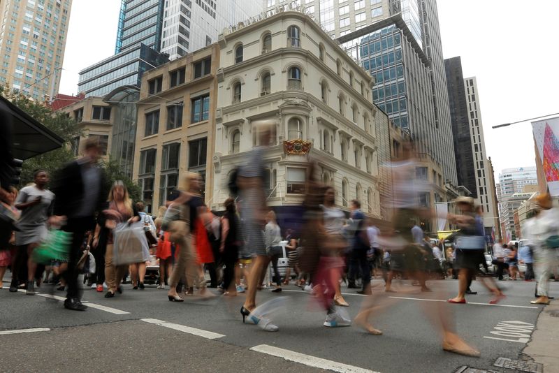 &copy; Reuters. FILE PHOTO: Office workers walk the streets of Sydney, Australia December 7, 2016 as the latest Australian GDP figure released Wednesday indicated a 0.5% contraction in the third quarter.REUTERS/Jason Reed