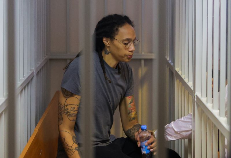 &copy; Reuters. FILE PHOTO: sketball player Brittney Griner, who was detained at Moscow's Sheremetyevo airport and later charged with illegal possession of cannabis, sits inside a defendants' cage after the court's verdict in Khimki outside Moscow, Russia August 4, 2022.
