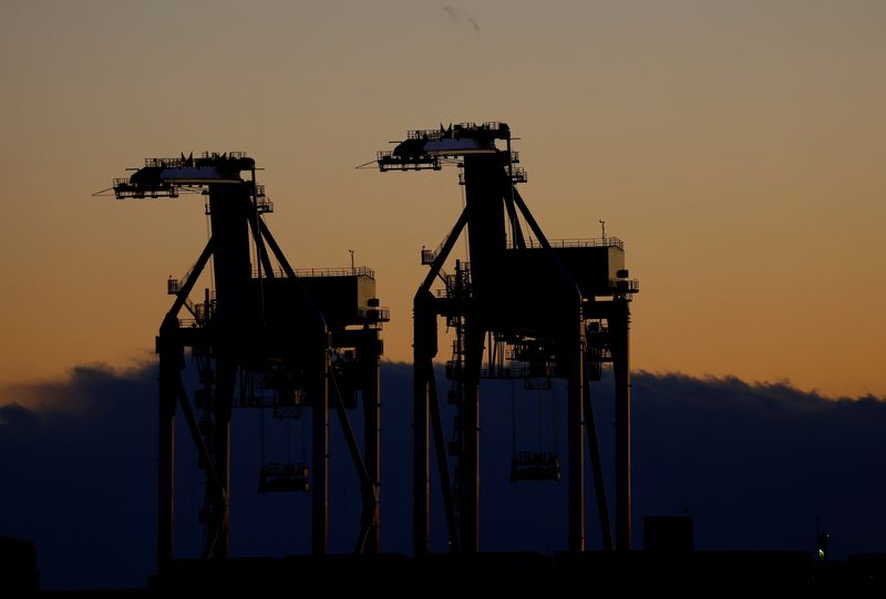 &copy; Reuters. FILE PHOTO: Cranes are seen at an industrial port in Tokyo, Japan, February 17, 2022. REUTERS/Kim Kyung-Hoon