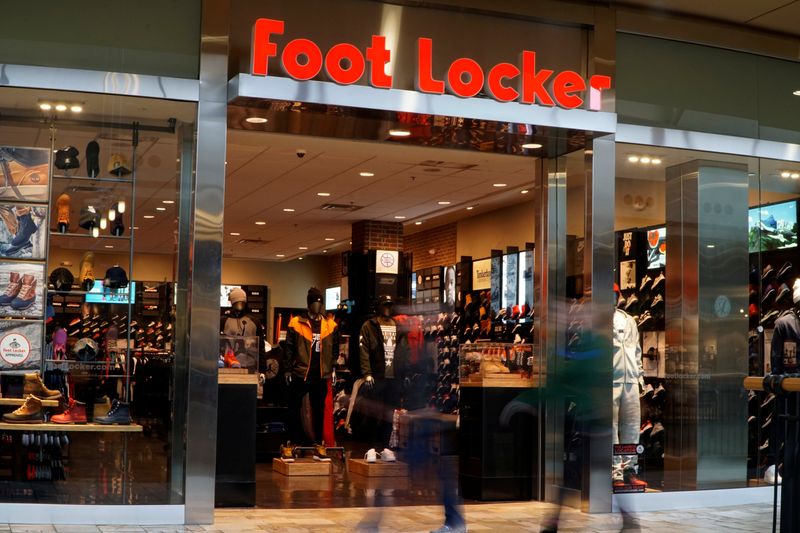 &copy; Reuters. Customers walk by the Foot Locker store in Broomfield, Colorado in a slow shutter exposure November 17, 2016.  REUTERS/Rick Wilking