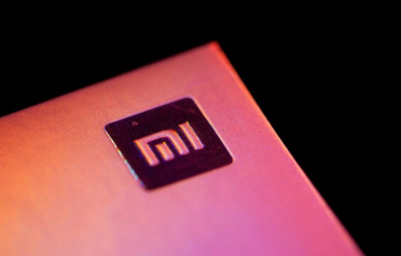 © Reuters. FILE PHOTO: Xiaomi logo is seen on a smartphone box in this illustration taken September 28, 2021. REUTERS/Dado Ruvic/Illustration/File Photo