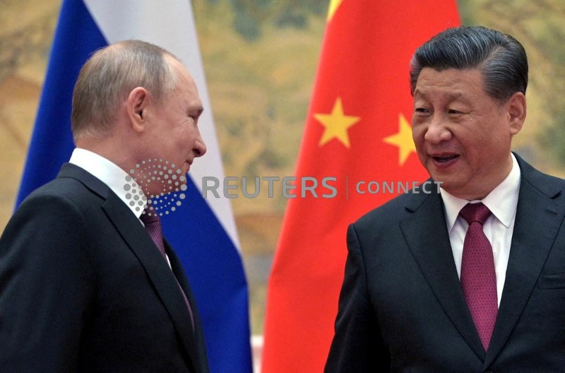 &copy; Reuters. FILE PHOTO: Russian President Vladimir Putin meets with Chinese President Xi Jinping in Beijing, China, February 4, 2022. Sputnik/Aleksey Druzhinin/Kremlin via REUTERS ATTENTION EDITORS - THIS IMAGE WAS PROVIDED BY A THIRD PARTY/File Photo