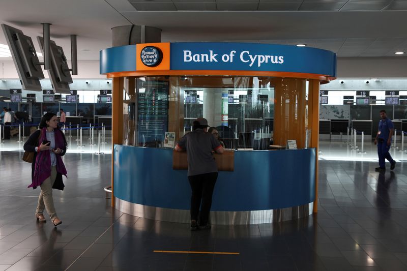 &copy; Reuters. A passenger makes a transaction at a branch of Bank of Cyprus at the departures building of Larnaca Airport in Larnaca, Cyprus April 15, 2016.  REUTERS/Yiannis Kourtoglou/File Photo