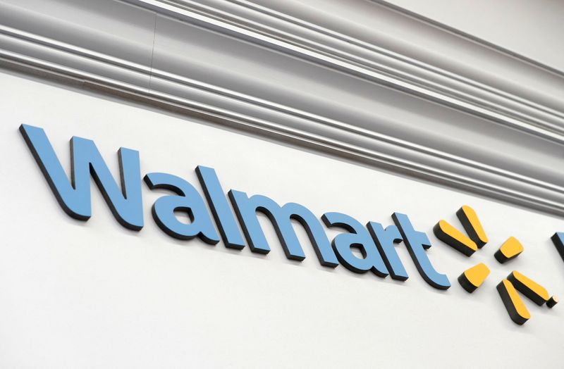 © Reuters. FILE PHOTO: A Walmart sign is seen inside its department store in West Haven, Connecticut, U.S., February 17, 2021. REUTERS/Mike Segar/File Photo