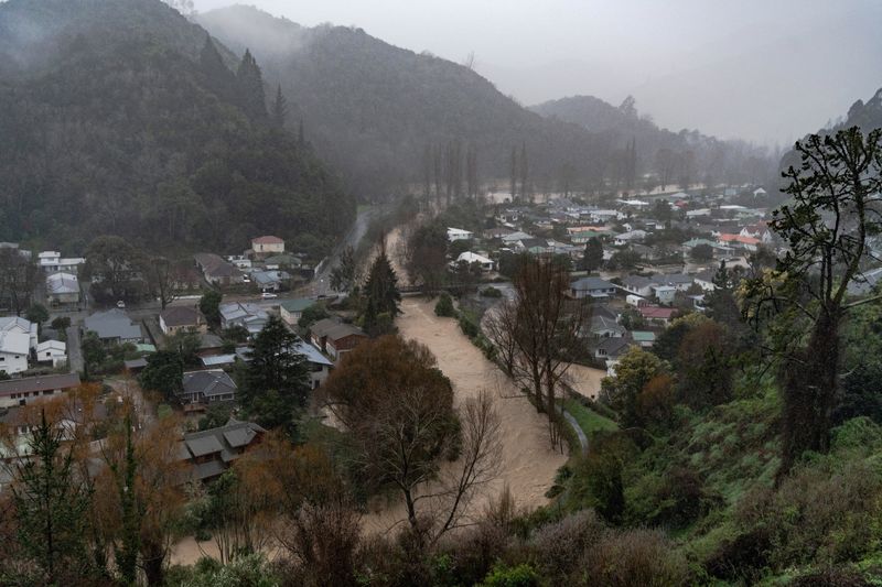 Rains pounding New Zealand ease, more people forced from their homes