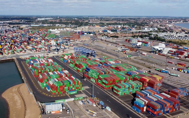 &copy; Reuters. FILE PHOTO: A view shows stacked shipping containers at the port of Felixstowe, Britain, October 13, 2021. Picture taken with a drone. REUTERS/Hannah McKay