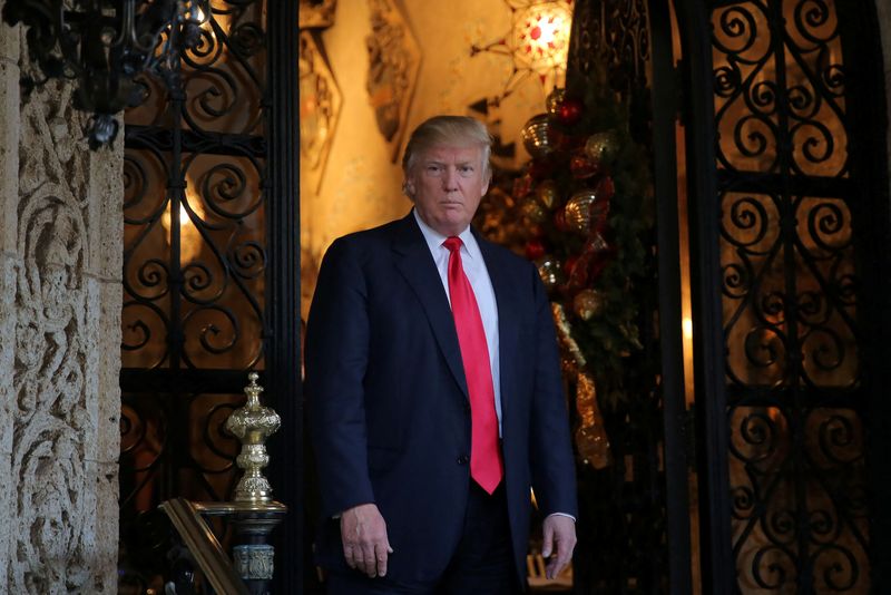 © Reuters. FILE PHOTO: U.S. President-elect Donald Trump pauses as he talks to members of the media after a meeting with Pentagon officials at Mar-a-Lago estate in Palm Beach, Florida, U.S., December 21, 2016. REUTERS/Carlos Barria