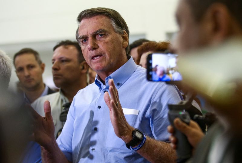 &copy; Reuters. FILE PHOTO: Brazil's President Jair Bolsonaro speaks to the media during a visit to a technology park as he starts his campaign as a presidential candidate in the national elections in Sao Jose dos Campos, Brazil August 18, 2022. REUTERS/Carla Carniel