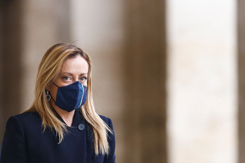 &copy; Reuters. FILE PHOTO - Brothers of Italy party leader Giorgia Meloni arrives for a meeting with Italian President Sergio Mattarella at the Quirinale Palace in Rome, Italy January 29, 2021. REUTERS/Guglielmo Mangiapane