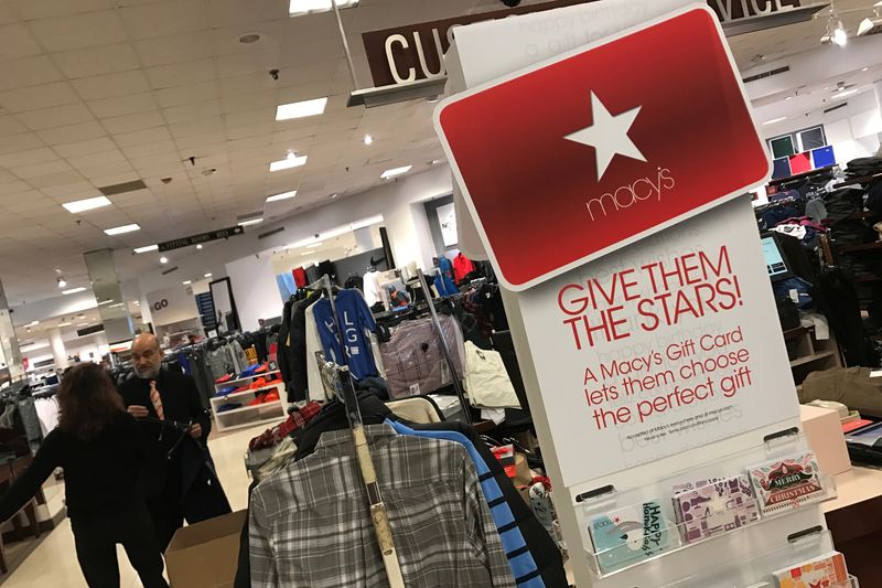 Macy's, Nordstrom cut profit views as excess inventory prompts discounts