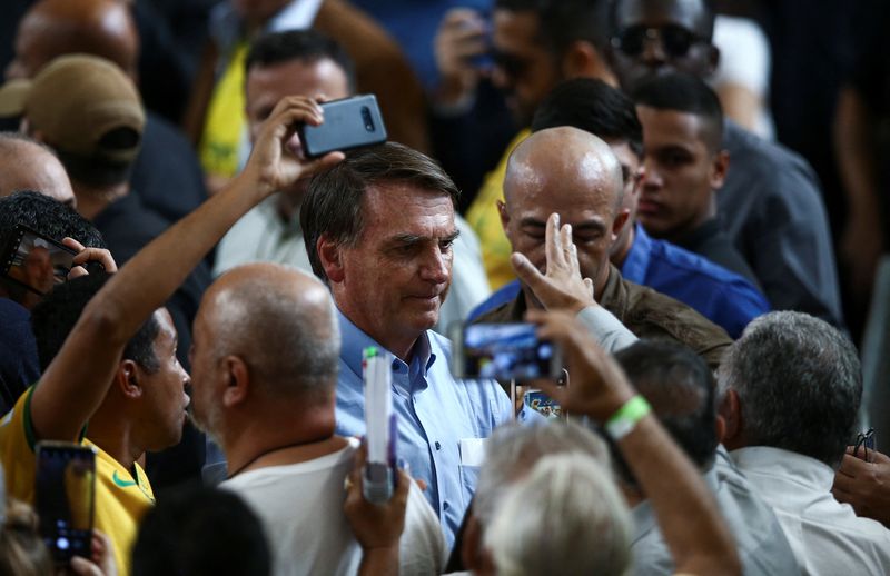 &copy; Reuters. FILE PHOTO - Brazil's President Jair Bolsonaro attends a rally during his campaign as a presidential candidate in the national elections in Sao Jose dos Campos, Brazil August 18, 2022. REUTERS/Carla Carniel