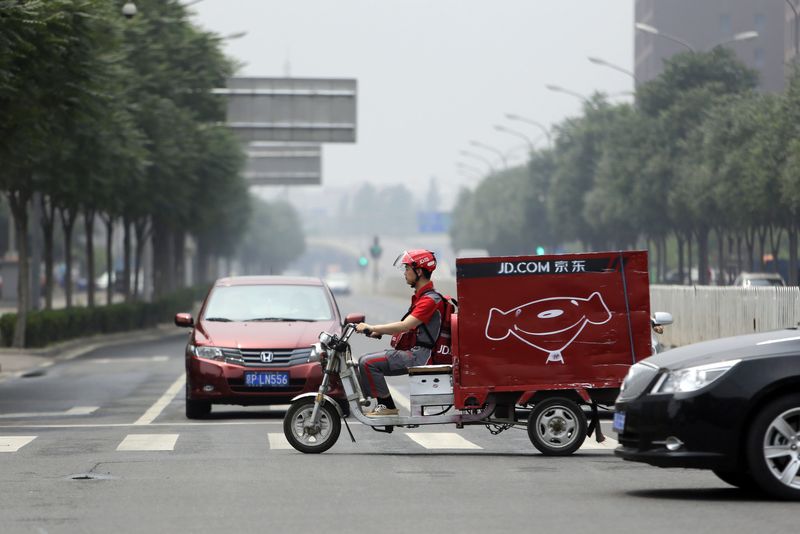 &copy; Reuters. 中国ＪＤドットコム（京東商城）の第２・四半期決算は、売上高が市場予想を上回った。２０１４年６月、北京で撮影（２０２２年　ロイター/Jason Lee）