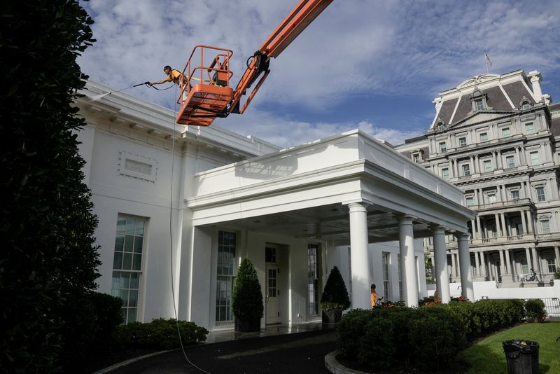 &copy; Reuters. FILE PHOTO: Workers clean the White House using high-pressure washers just after U.S. President Joe Biden departed the South Lawn to Rehoboth Beach, Delaware at the White House in Washington, D.C., U.S. August 7, 2022. REUTERS/Ken Cedeno