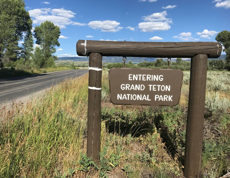 &copy; Reuters. FILE PHOTO: A signpost greets travelers at the Gros Ventre entrance to Grand Teton National Park, in Jackson Hole, Wyoming, U.S, July 12, 2017. REUTERS/Ann Saphir