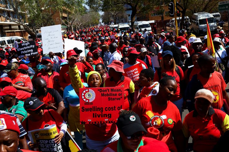 &copy; Reuters. South Africa's labour unions Congress of South Africa Trade Unions (COSATU), South African Federation of Trade Unions (SAFTU) and other unions, carry placards during a nationwide strike over the high cost of living, in Pretoria, South Africa, August 24, 2