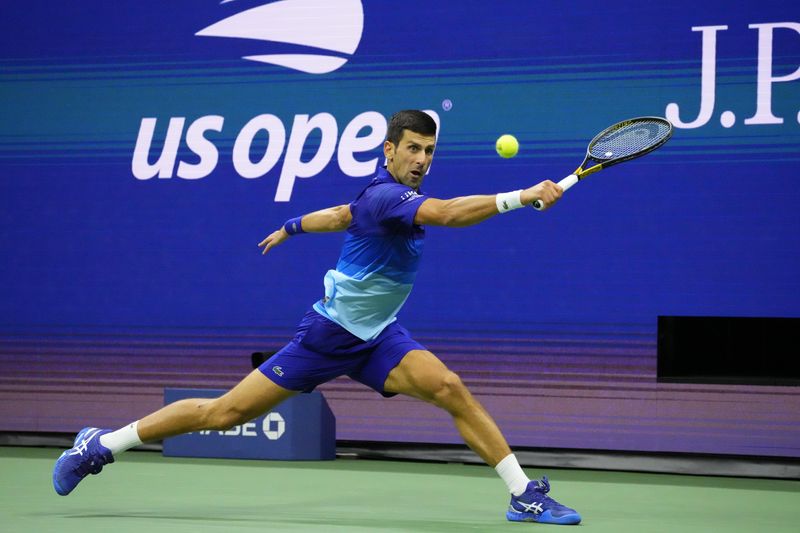 &copy; Reuters. Sep 10, 2021; Flushing, NY, USA; Novak Djokovic of Serbia hits a backhand against Alexander Zverev of Germany (not pictured) on day twelve of the 2021 U.S. Open tennis tournament at USTA Billie Jean King National Tennis Center. Mandatory Credit: Robert De