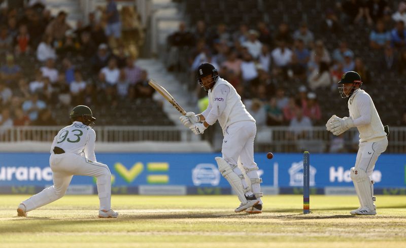 © Reuters. Cricket - Second Test - England v South Africa - Emirates Old Trafford, Manchester, Britain - August 25, 2022 England's Jonny Bairstow in action Action Images via Reuters/Jason Cairnduff