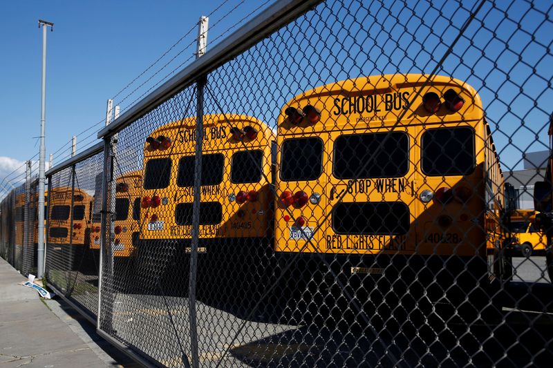 © Reuters. School buses parked in a file photo. REUTERS/Stephen Lam  