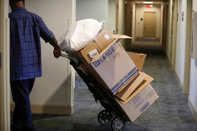 &copy; Reuters. FILE PHOTO: Empty boxes are taken out during move in day as Bennett College students return to campus for the first time since the HBCU Liberal Arts College went remote to prevent the spread of the coronavirus disease (COVID-19) in March 2020, in Greensbo