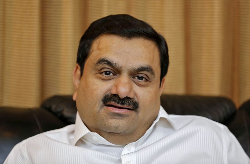 &copy; Reuters. FILE PHOTO: Indian billionaire Gautam Adani speaks during an interview with Reuters at his office in the western Indian city of Ahmedabad in this April 2, 2014 file photo.    REUTERS/Amit Dave