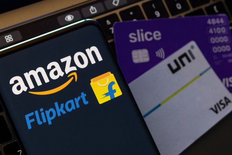 &copy; Reuters. Amazon and Flipkart logos are seen near Slice and Uni credit card mockups in this illustration taken August 25, 2022. REUTERS/Dado Ruvic/Illustration