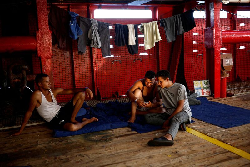 Rescue boat celebrates as stranded migrants given ok to disembark in Italy