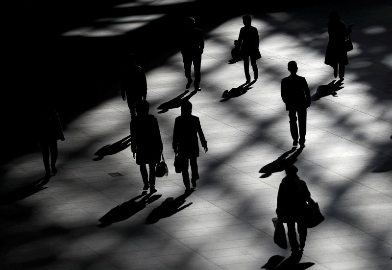 &copy; Reuters. FILE PHOTO: People walk inside a building in Tokyo, Japan January 23, 2019. REUTERS/Issei Kato