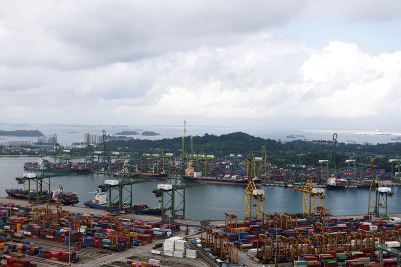 &copy; Reuters. FILE PHOTO: A view of the Brani, Keppel and Tanjong Pagar container terminals in Singapore August 19, 2022. REUTERS/Edgar Su