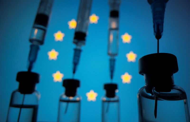 &copy; Reuters. Vials and syringes are seen in front of displayed EU flag in this illustration photo taken March 16, 2021. REUTERS/Dado Ruvic/Illustration/Files
