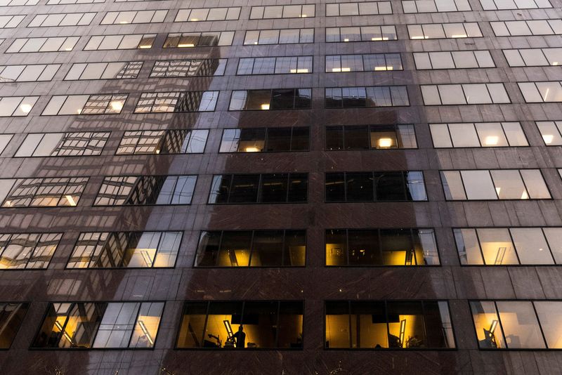 &copy; Reuters. FILE PHOTO: A man works inside Jefferies Financial Group offices in Manhattan, New York City, U.S., December 8, 2021. REUTERS/Eduardo Munoz/File Photo