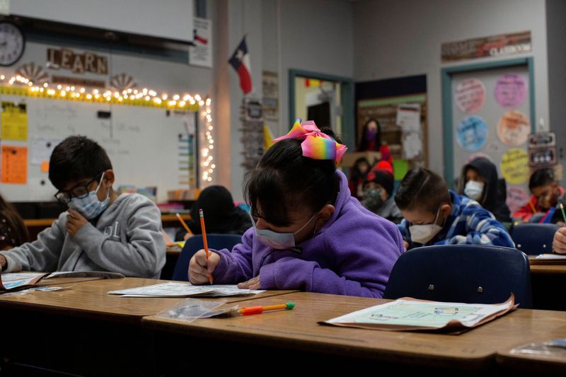 &copy; Reuters. Students attend a class, as returning to schools with coronavirus disease (COVID-19) prevention measures began, in San Antonio, Texas, U.S., January 11, 2022.  REUTERS/Kaylee Greenlee Beal/Files